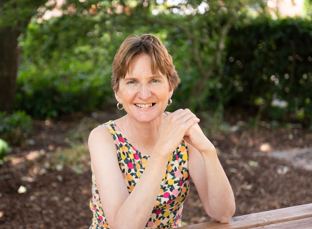 Rachel, smiling at the camera.